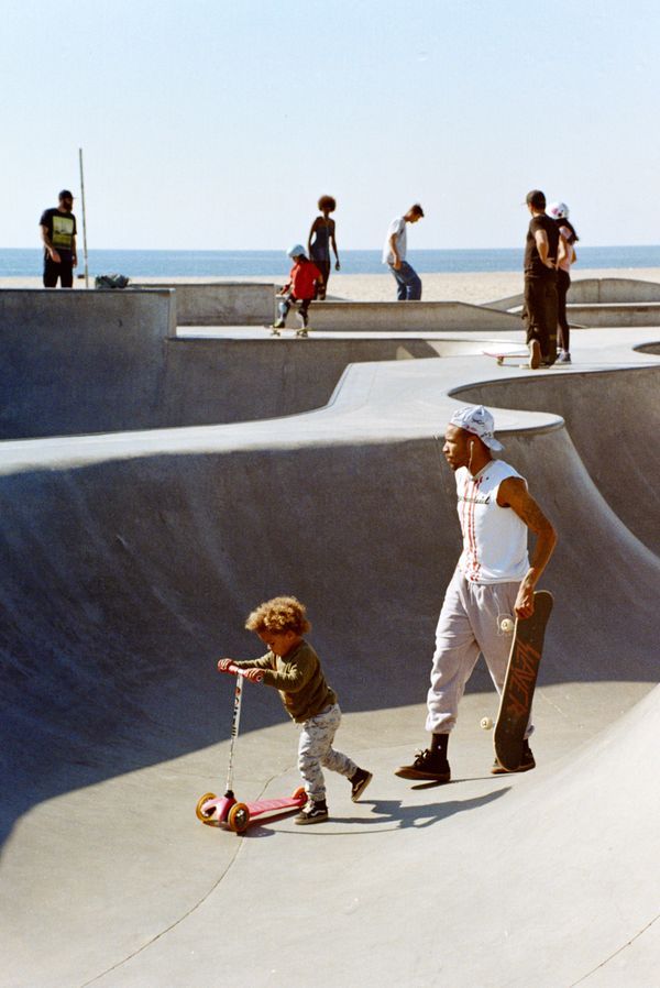 There's something about this photo that makes me smile. This guy was absolutely ripping for about an hour before his son turned up. The joy on his face and change in his demeanor was so visible. Scooters aren't really allowed in the park (unspoken rule) but this little lad was welcomed no questions asked. It can be hard to see someone so small in the bowl, the Dad was walking behind him so other skaters knew not to come barreling through.