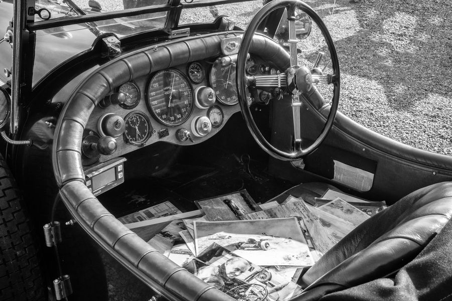 Vintage Car with Vintage Photos in Cab.