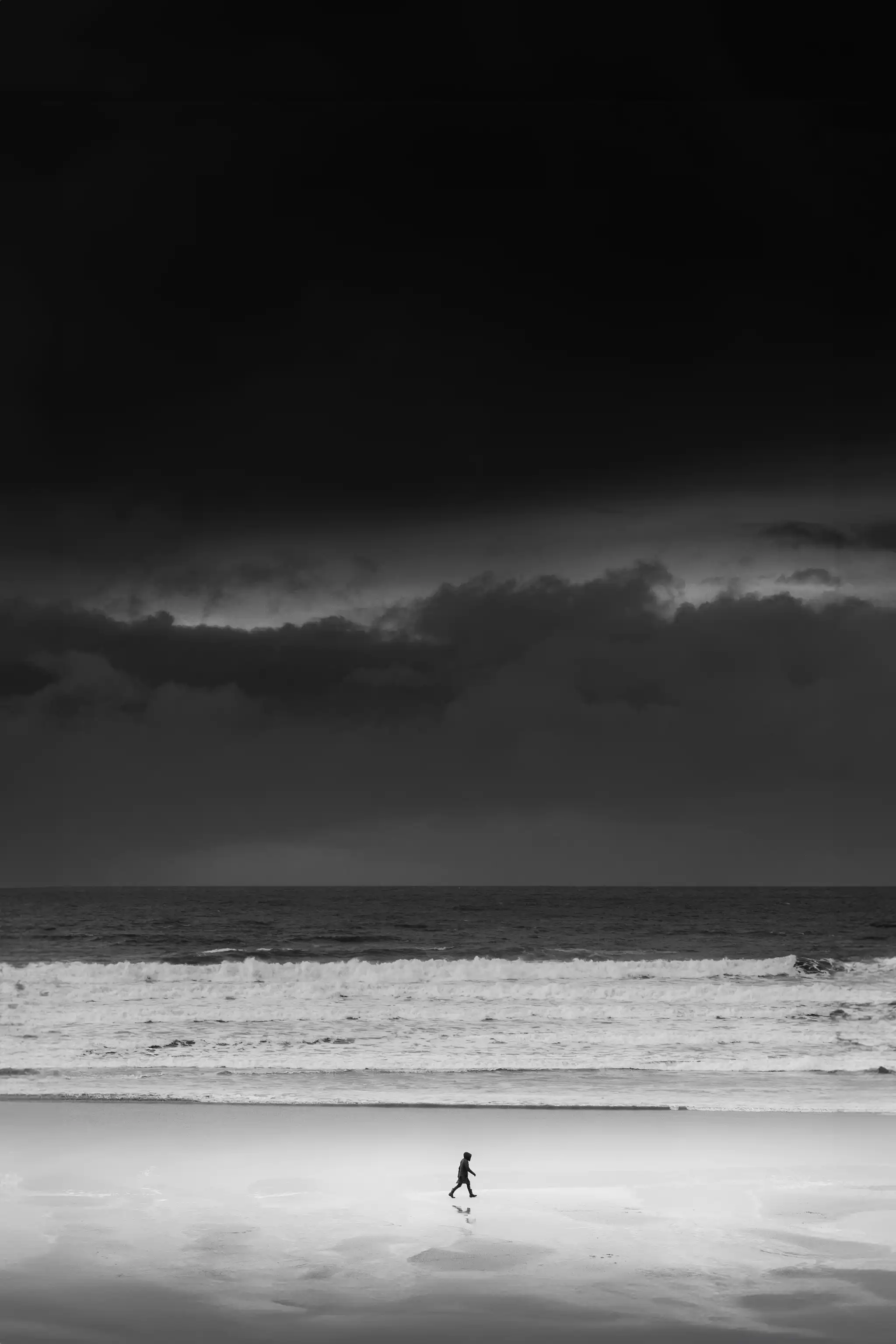 'Walking under dark skies'