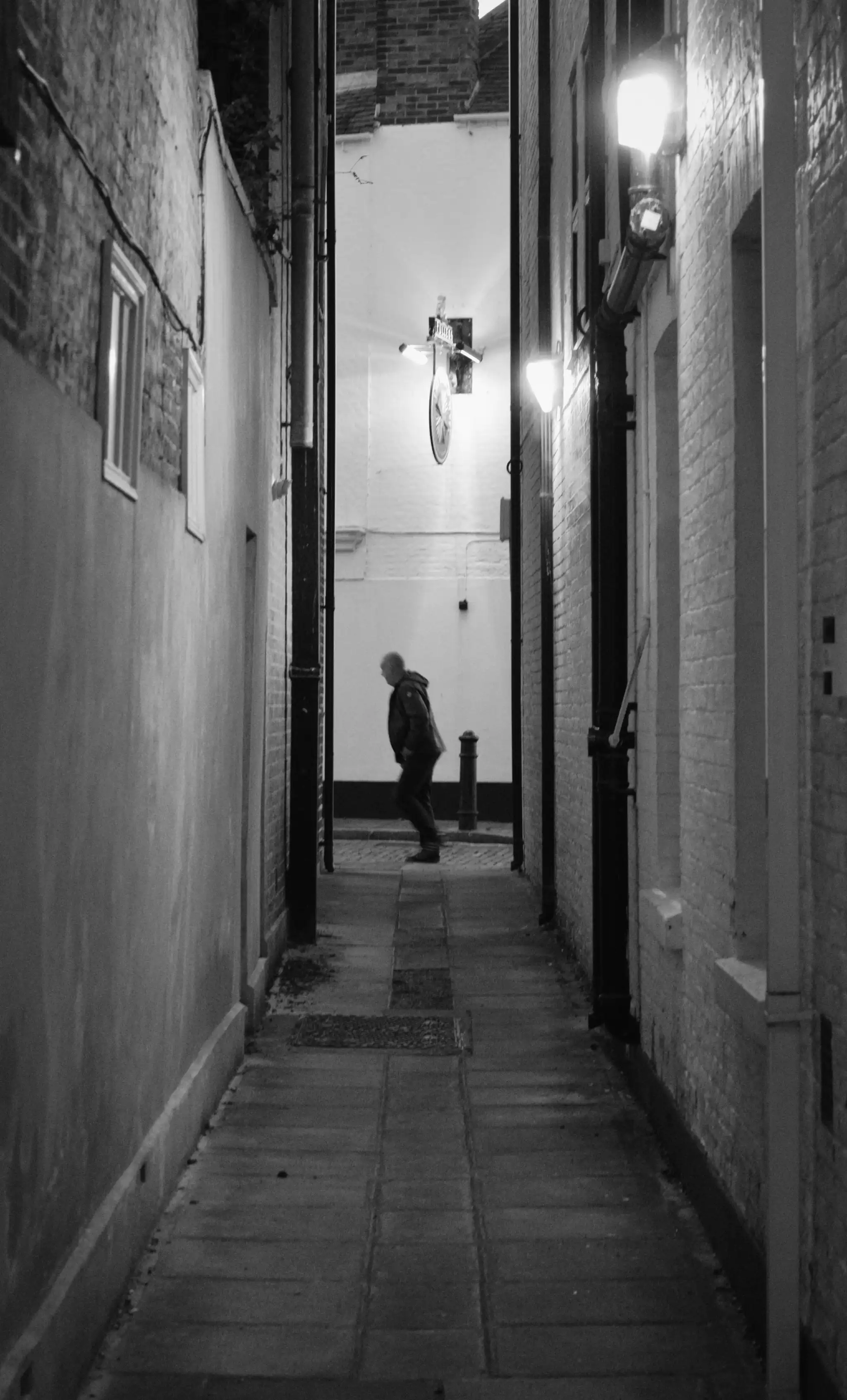 Man on cobbled streets