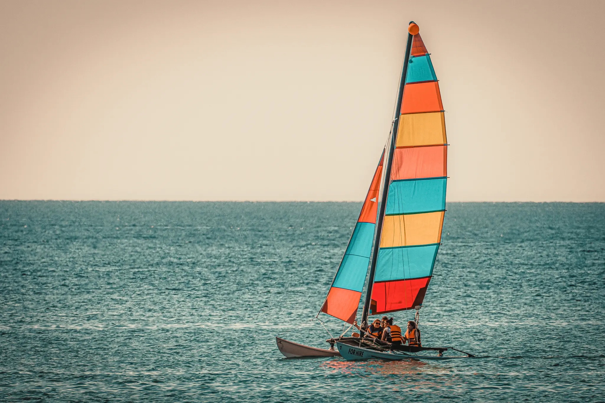Calm Seas and Colourful Sails